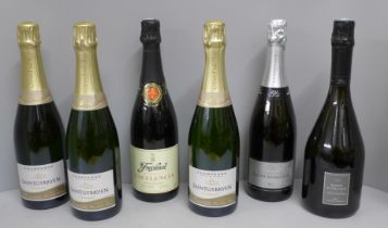 Six bottles; three Saintgybryen Champagne, two Roger Manceaux Champagne and one Freixenet Spanish