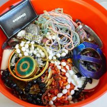 A tub of costume jewellery