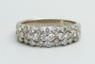 An 18ct white gold, three row diamond ring, marked 0.73ct on the shank, (carat weight), with