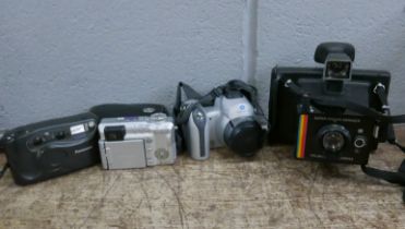 Four cameras, Pentax, Polaroid, Minolta and Panasonic **PLEASE NOTE THIS LOT IS NOT ELIGIBLE FOR