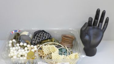 A collection of costume jewellery and other assorted items