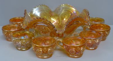 A carnival glass punch set