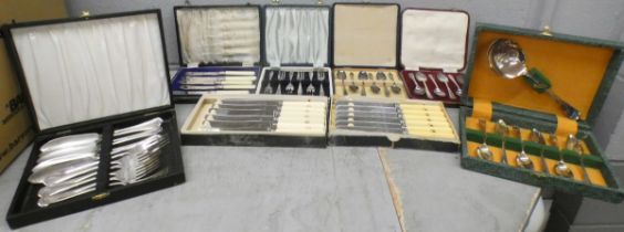 A collection of flatware, eight boxes/cases, including grapefruit spoons **PLEASE NOTE THIS LOT IS