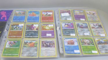 A collection of Pokemon holographic cards, 240 in total