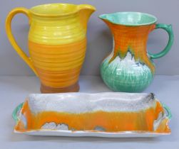 Two Shelley dripglaze jugs and tray