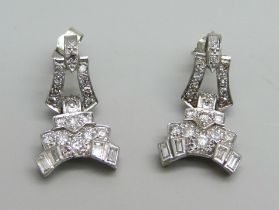 A pair of Art Deco diamond earrings, test as platinum, 6.3g, (possibly adapted from a cocktail