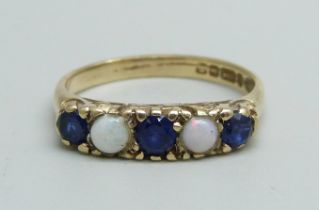 A 9ct gold, sapphire and opal ring, 2.1g, K