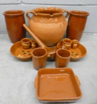 A collection of Spanish terracotta including bowls, cups, utensil pots, pots with lids, etc. **