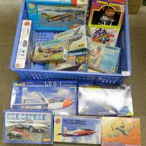 A collection of plastic model kits including Airfix, Revell and boxed games and toys