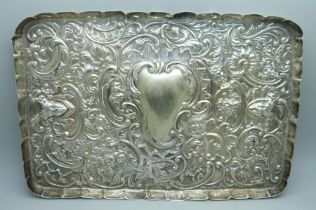 A William Comyns embossed silver tray, London 1900, 256g, 18 x 26.5cm