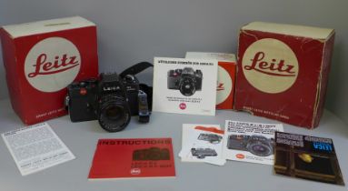 A Leica R3 camera and 1:2/50 lens, both with boxes