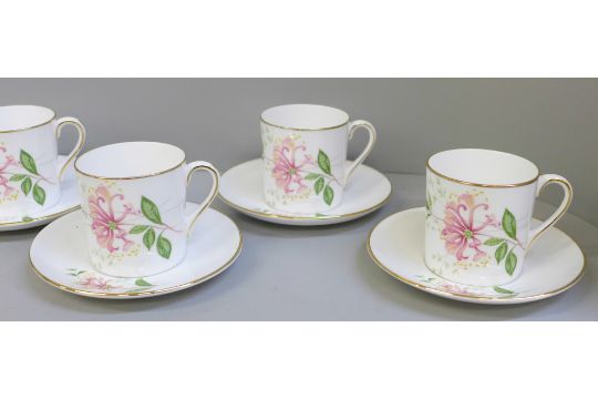 Six Shelley coffee cans and saucers decorated with flowers - Image 3 of 5