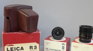 Two Leitz Leicaflex lenses, 1:4/35 and 1:2/90, boxed and a Leitz leather camera case, boxed