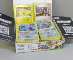 200 Reverse holo Pokemon cards including Black Star rares