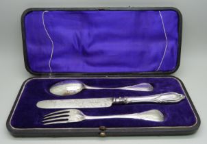 A Victorian three piece silver Christening set, London 1875, knife with silver blade, total weight