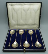 A cased set of six silver seal top spoons, Elkington & Co., Birmingham 1924, 74g