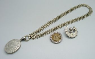 A Victorian locket, a collarette, a photograph brooch and a Victorian silver horse riding brooch,