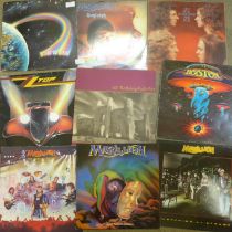 A collection of LP records including AC/DC, Blondie, Marillion, Rainbow, U2, etc.