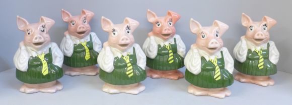 Six Nat West Annabel pig money banks, one without stopper