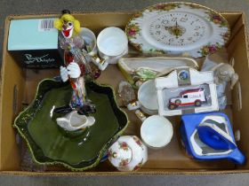 A box of assorted china, Lladro figure of a girl with dog, a Sylvac dish with swan, teapot with