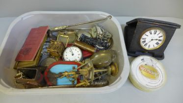 A travel clock, pocket watch, car badge, etc.