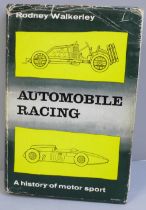 A 1962 motor racing book signed by Mike Hailwood, Stirling Moss and Denny Hulme