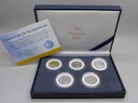 A Franklin Mint United States Mint coin set, 5x 2002 State Quarter Dollar coins