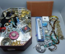 A collection of costume jewellery, scarf clips, watch, etc.
