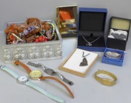 Costume jewellery, a Baltic amber necklace, etc.