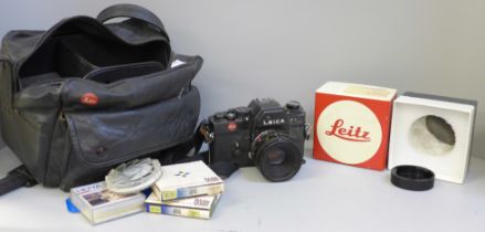 A Leica R3 camera, 1:2/50 lens, box with boxes