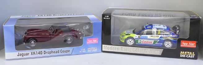 Two Sun Star metal die-cast model vehicles; a Ford Focus WRC and Jaguar 140 Drophead Coupe, boxed