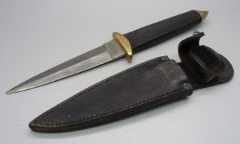 A dagger marked Especial Comando, with scabbard, (tip of blade a/f)
