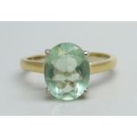 A silver gilt and green solitaire ring, L