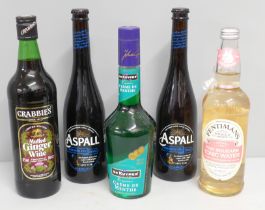 A collection of alcohol, De Kuyper Creme de menthe, two bottles of Aspall, mulled ginger wine and