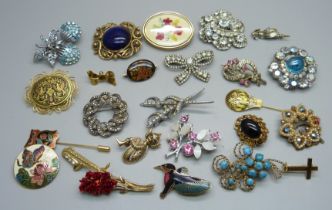 Twenty-three costume brooches and two stick pins