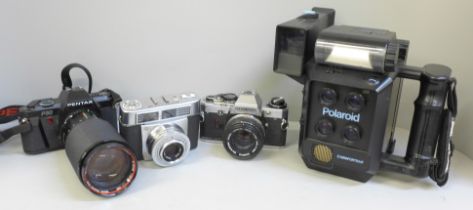 Cameras; Olympus OM10, Contessa LK, Pentax P30 and a Polaroid mini portrait
