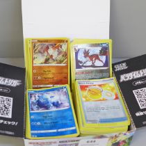 200 Reverse holo Pokemon cards including Black Star rares