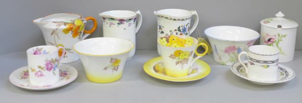 A collection of Shelley china including three cream jugs, a Phlox pattern cup, saucer and sugar