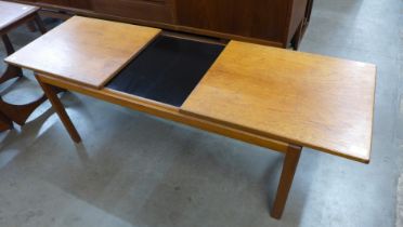 A McIntosh teak extending coffee table