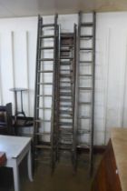 Three sets of pine ladders