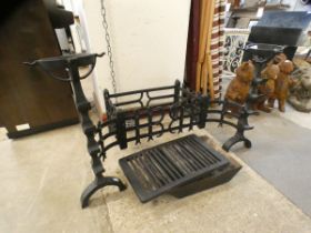 A Victorian style cast iron fire grate