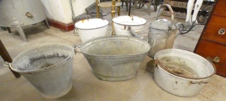 Assorted galvanised and enamelled buckets and a watering can