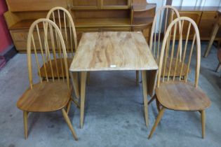 An Ercol elm and beech Windsor drop-leaf table and four Quaker chairs