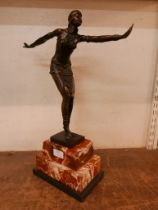 An Art Deco bronze picture of an exotic dancer, on large marble socle