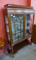 An Edward VII inlaid mahogany two door dispaly cabinet