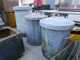 Three galvanised dustbins and covers