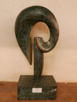 A Surrealist style bronze sculpture