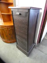 An early 20th Century oak tambour front filing cabinet (locked and without key)