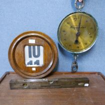 A set of Waymaster Scales, a spirit level and an oak perpetual calendar