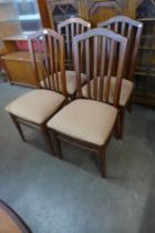 A set of four Stag teak dining chairs